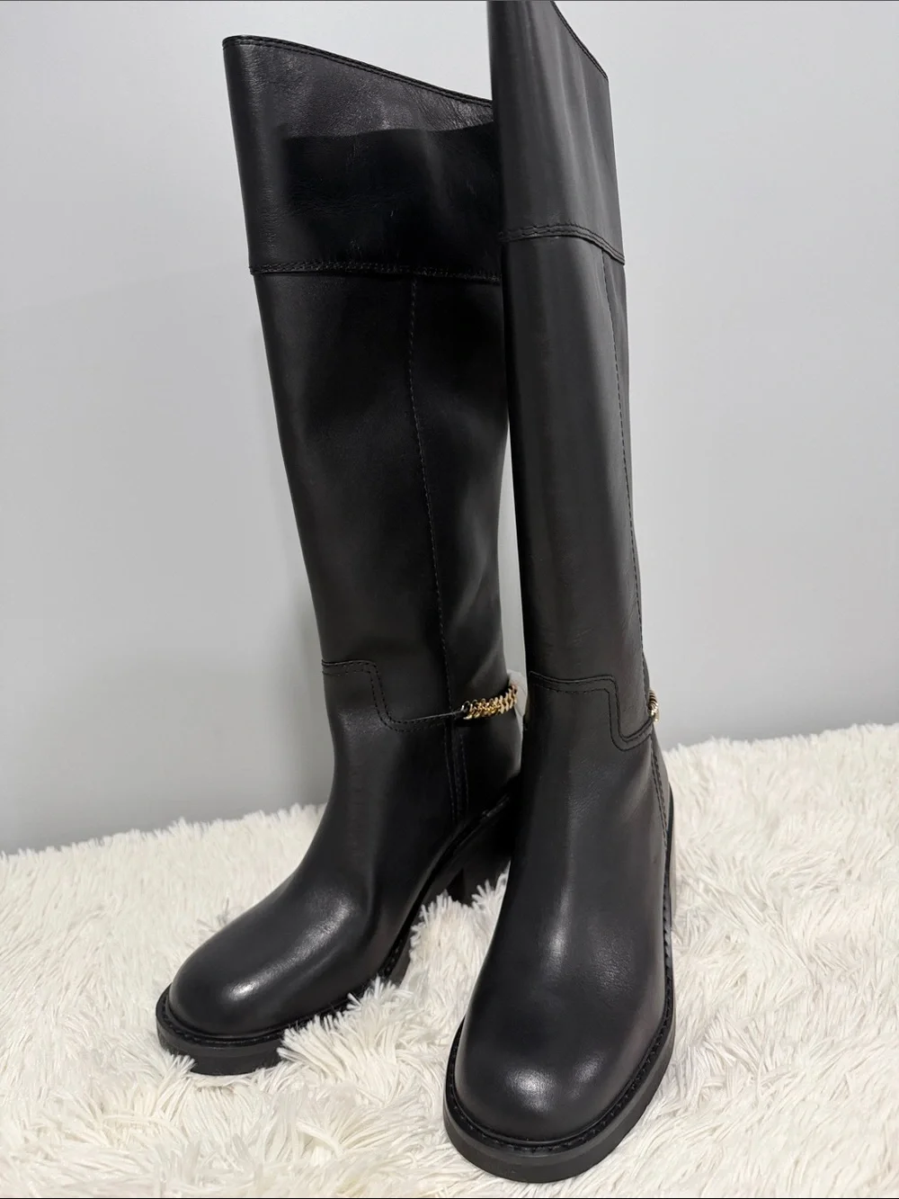 MICHAEL Michael Kors Black Leather Over-the-Knee Boots with Gold Chain Accent